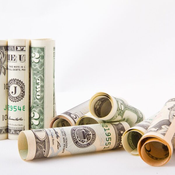 Paper money – dollars rolled into a tube