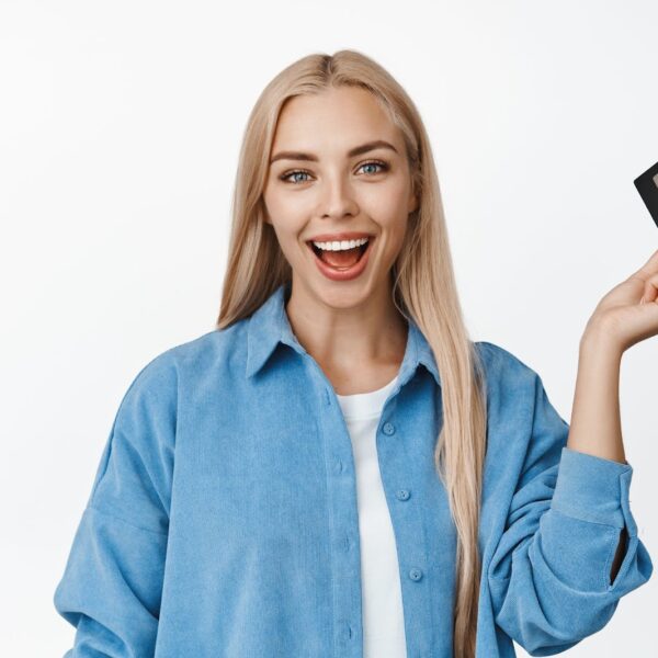 Happy woman with credit card