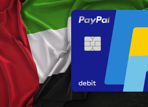 UAE flag beneath a PayPal debit card
