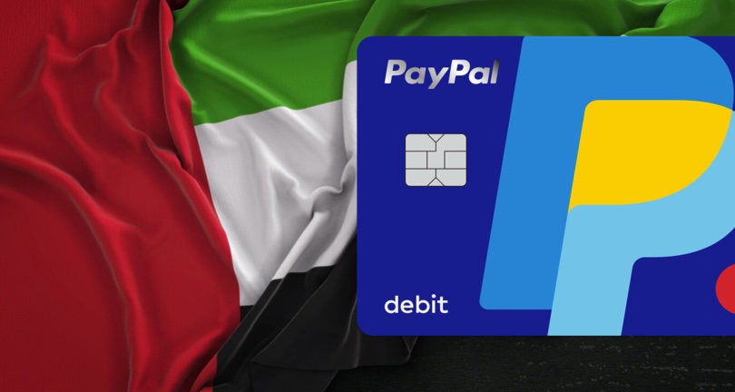 UAE flag beneath a PayPal debit card