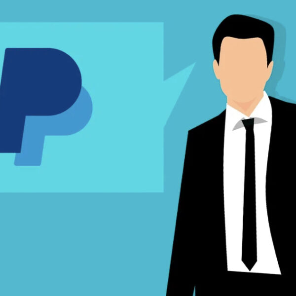 Man in suit and PayPal logo